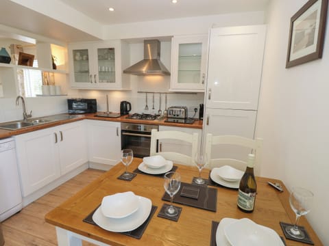 Fridge, electric kettle, toaster, cookware/dishes/utensils