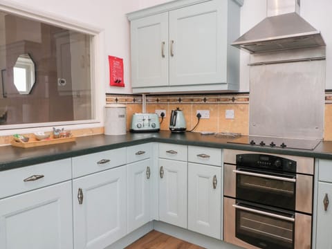 Fridge, electric kettle, toaster, cookware/dishes/utensils