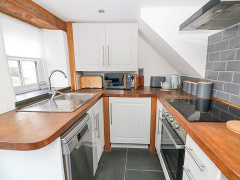 Fridge, dishwasher, toaster, cookware/dishes/utensils