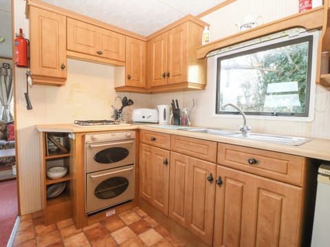 Fridge, electric kettle, toaster, cookware/dishes/utensils