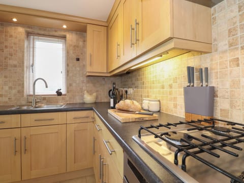 Fridge, dishwasher, toaster, cookware/dishes/utensils