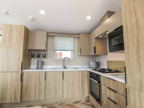 Fridge, electric kettle, toaster, cookware/dishes/utensils