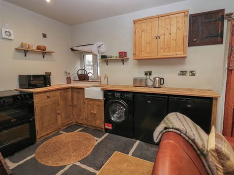 Fridge, electric kettle, toaster, cookware/dishes/utensils