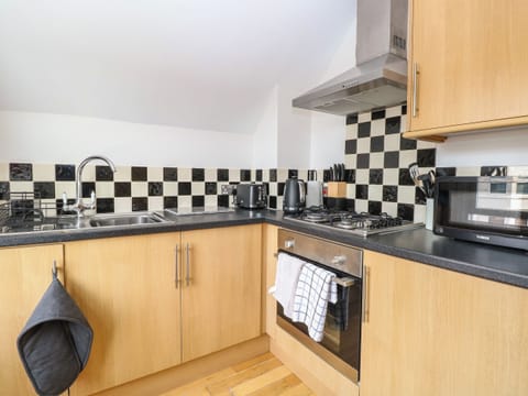 Fridge, electric kettle, toaster, cookware/dishes/utensils