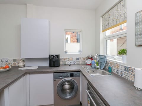 Fridge, dishwasher, electric kettle, cookware/dishes/utensils