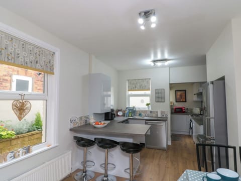 Fridge, dishwasher, electric kettle, cookware/dishes/utensils