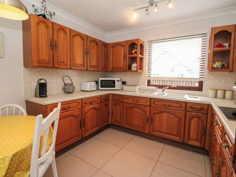 Fridge, electric kettle, cookware/dishes/utensils