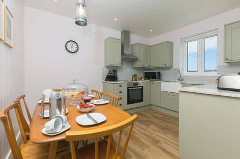 Fridge, electric kettle, toaster, cookware/dishes/utensils