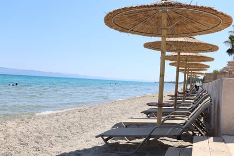 Private beach, sun loungers, beach umbrellas, beach towels