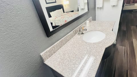 Desk, laptop workspace, free WiFi, bed sheets