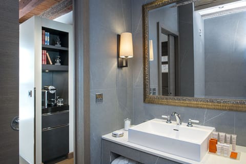 Junior Suite | Bathroom | Rainfall showerhead, designer toiletries, hair dryer, bathrobes