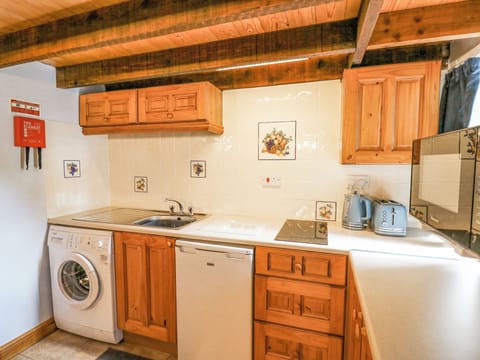 Fridge, electric kettle, toaster, cookware/dishes/utensils