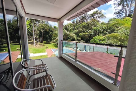 Deluxe Room, Pool View | Terrace/patio
