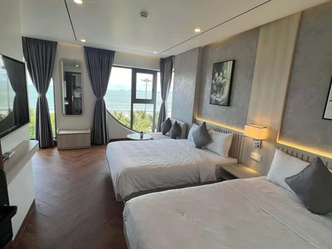 Family Quadruple Room, Partial Ocean View | Soundproofing, WiFi (free)
