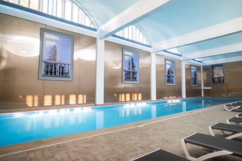 Indoor pool, seasonal outdoor pool, open noon to 9:00 PM, sun loungers