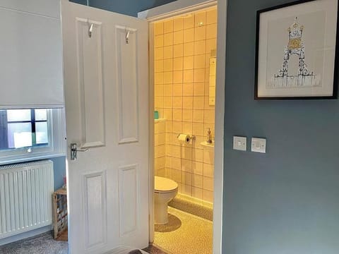 Shower, hair dryer, towels, toilet paper