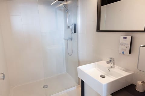 Combined shower/tub, eco-friendly toiletries, hair dryer, towels