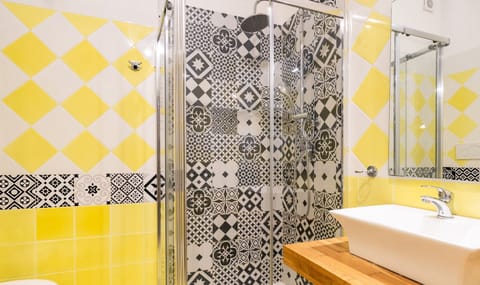 Double Room | Bathroom | Shower, hair dryer, towels, soap