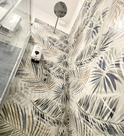 Double Room | Bathroom | Shower, hair dryer, towels, soap