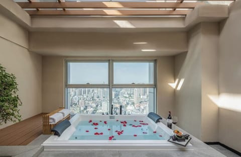 King Bed with  terrace and outdoor soaking pool | Bathroom | Free toiletries, hair dryer, bathrobes, slippers