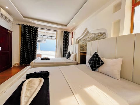 Deluxe Penthouse, Ocean View | Desk, iron/ironing board, free WiFi