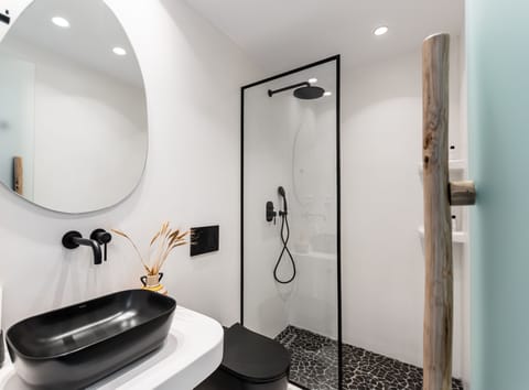 Superior Suite, Balcony, Sea View | Bathroom | Shower, hair dryer, slippers, towels