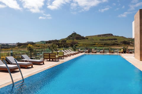 Indoor pool, seasonal outdoor pool, pool umbrellas, sun loungers