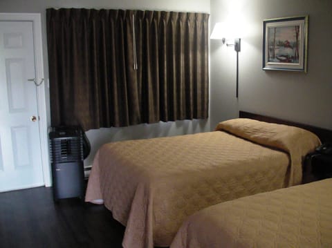 Standard Room, 2 Double Beds | Desk, iron/ironing board, rollaway beds, free WiFi