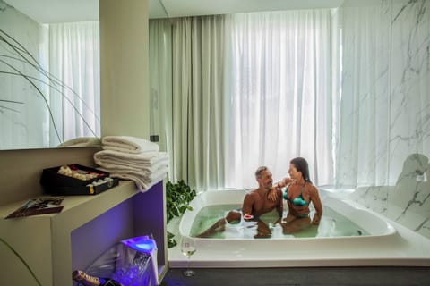 Luxury Suite, Sea Facing | Bathroom | Hair dryer, slippers, towels, soap