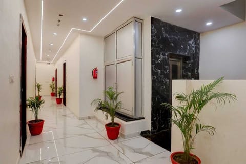 Deluxe Double Room | Living area | 32-inch LED TV with cable channels
