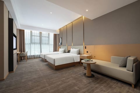 Classic Twin Room | Down comforters, desk, laptop workspace, blackout drapes