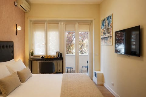 Double or Twin Room, Private Bathroom | Free minibar, in-room safe, desk, laptop workspace