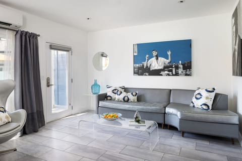 Suite, 1 King Bed with Sofa bed, Pool View | Pillowtop beds, in-room safe, desk, blackout drapes