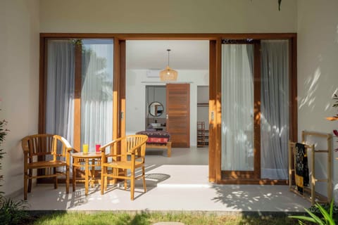 Deluxe Double Room, Garden View | Terrace/patio