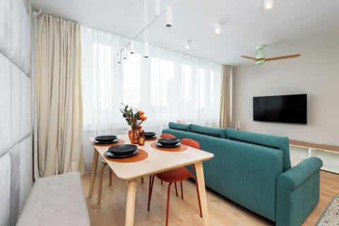 Family Apartment, City View | Living area | 50-inch Smart TV with cable channels, Netflix, streaming services