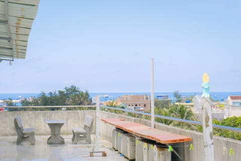 Triple Room, Multiple Beds, Pets Allowed, Ocean View | Desk, blackout drapes, soundproofing