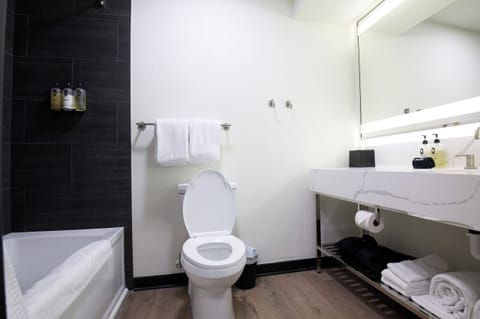 Combined shower/tub, hair dryer, bathrobes, towels