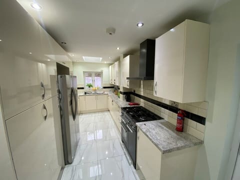 Mini-fridge, microwave, oven, stovetop