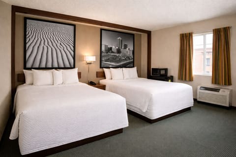 Pillowtop beds, desk, cribs (free), WiFi (free)