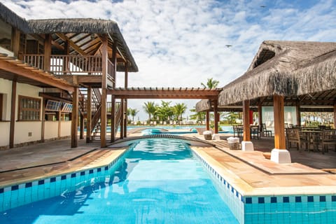 Outdoor pool, open 9 AM to 8 PM, pool umbrellas, sun loungers