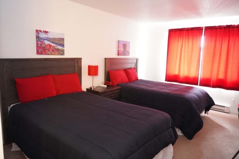 Blackout drapes, iron/ironing board, free WiFi, bed sheets