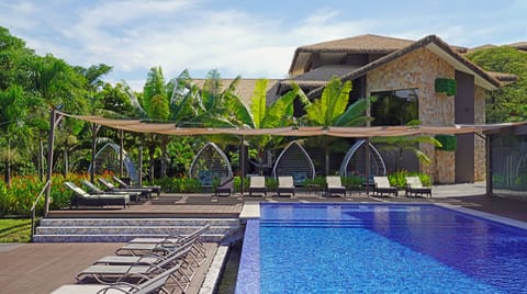 Outdoor pool, open 7:00 AM to 10:00 PM, sun loungers