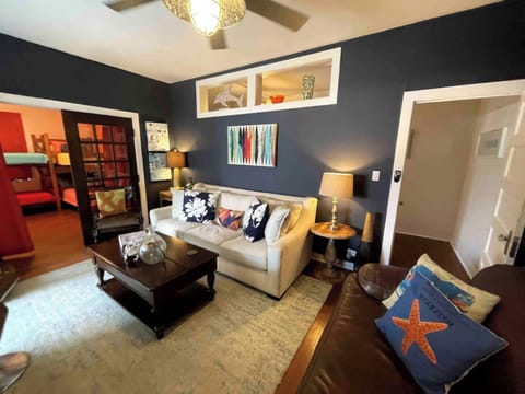 Signature Condo, 3 Bedrooms, Kitchen, City View | Living room | 49-inch Smart TV with cable channels