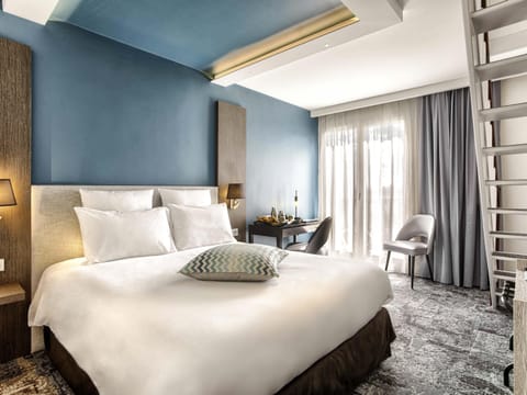 Superior Duplex (1Double and 2Single Beds, Spa Access) | In-room safe, desk, blackout drapes, iron/ironing board