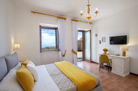 Comfort Triple Room, Sea View | In-room safe, desk, laptop workspace, blackout drapes