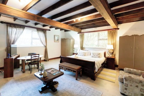 Deluxe Double Room, Air conditioning | Desk, laptop workspace, iron/ironing board, free WiFi