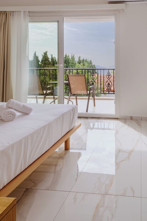 Standard Suite, Balcony, Sea View | In-room safe, blackout drapes, iron/ironing board, free WiFi