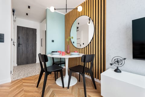 Comfort Apartment, City View | Living area | 50-inch Smart TV with cable channels, Netflix, streaming services