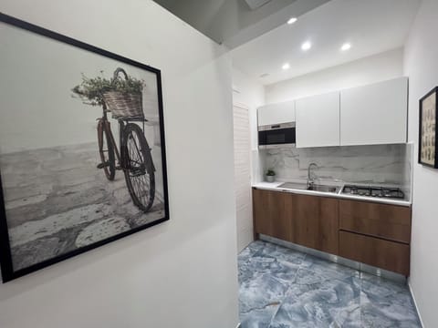 Classic Quadruple Room, Kitchen | Private kitchen | Espresso maker, coffee/tea maker, electric kettle