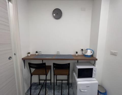 Basic Room, Refrigerator & Microwave | In-room safe, blackout drapes, iron/ironing board, free WiFi